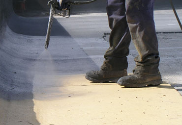 Coating systems over Overland Park spray foam roof systems